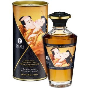 SHUNGA APHRODISIAC WARMING OIL CARAMEL KISSES 100 ML é um Óleo, Lubrificante e Creme com efeito afrodisíaco.